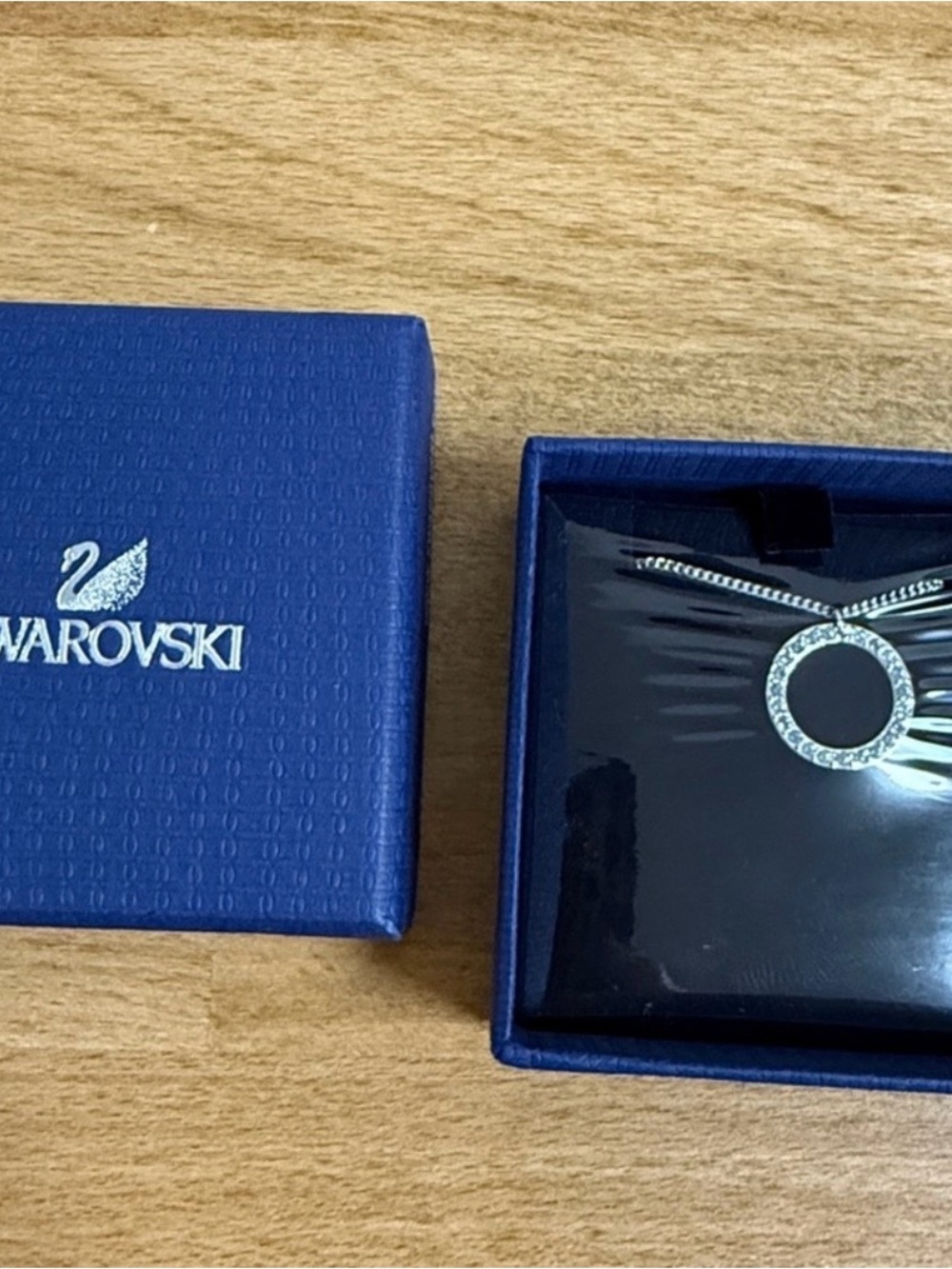 Swarovski silver tone chain with Crystal embellished Circle Pendant.